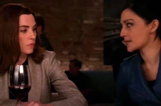 Julianna Margulies and Archie Panjabi seated at a bar in 